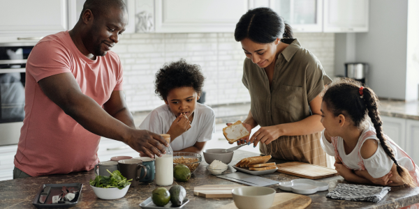 Family cooking together in a modern kitchen